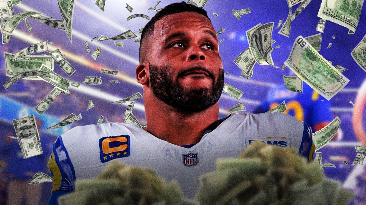 Aaron Donald surrounded by piles of cash.