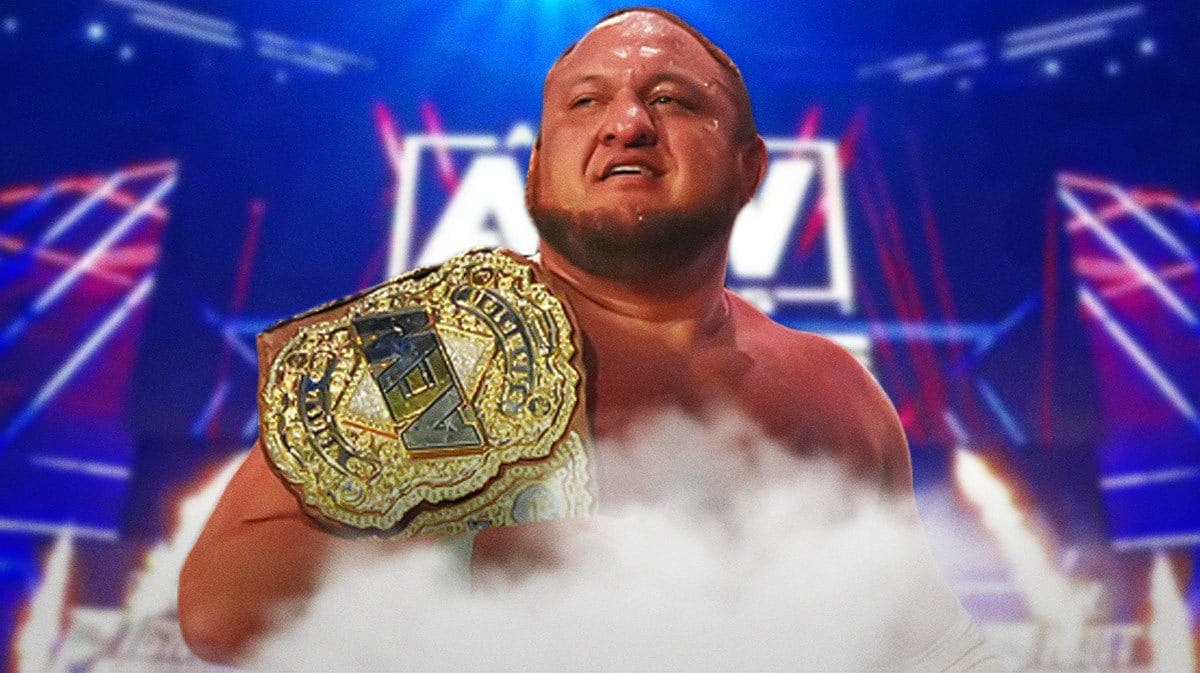 Samoa Joe holding the AEW World Championship with with 2024 AEW Dynamite logo as the background.