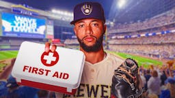 Brewers star Devin Williams with animated tears and while holding first-aid kit