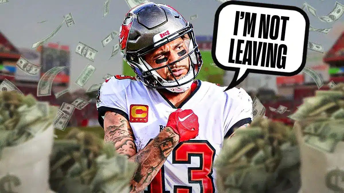 Buccaneers wide receiver Mike Evans with money all around him