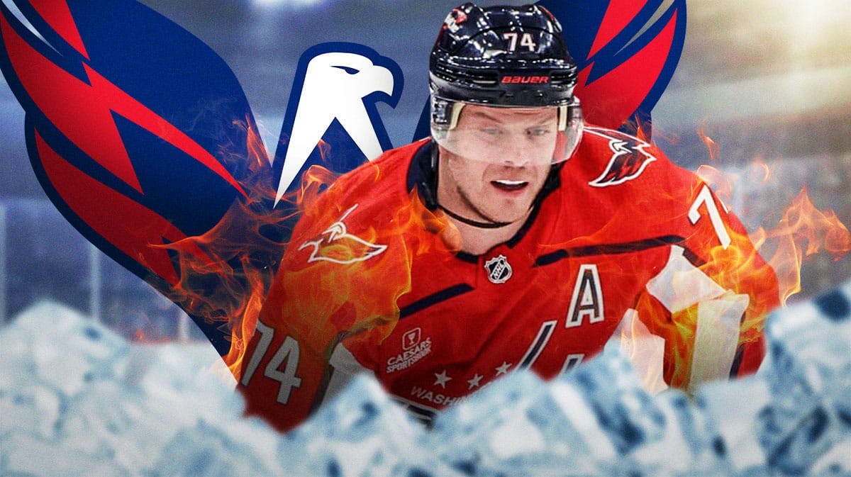John Carlson in middle of image with fire around him, WSH Capitals logo, hockey rink in background