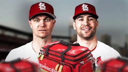 Cardinals' players Sonny Gray and Dylan Carlson with a medical bag on him.