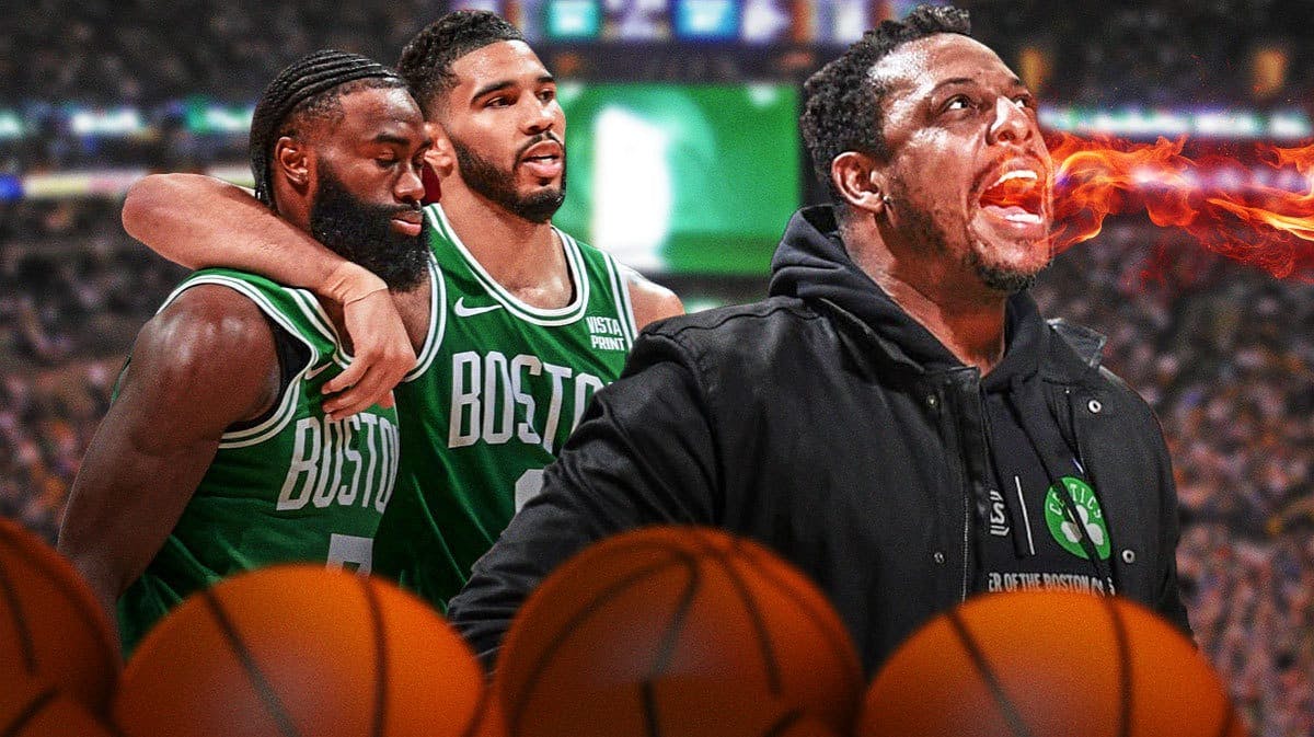 Celtics' Jayson Tatum and Jaylen Brown looking at Paul Pierce