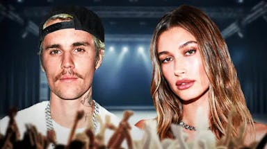 Hailey Bieber and Justin Bieber with a stage behind them