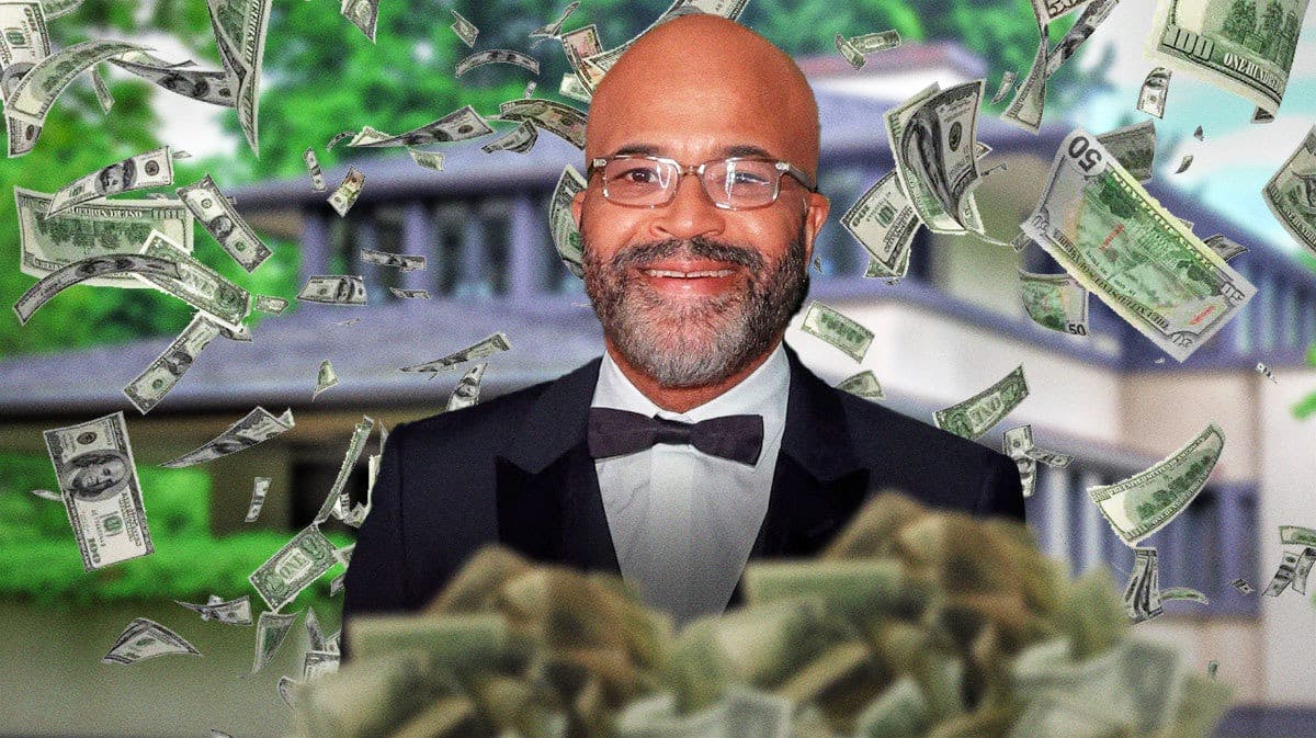 Jeffrey Wright surrounded by piles of cash.