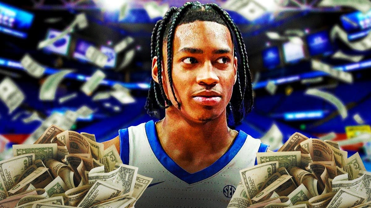 Kentucky Wildcats guard Rob Dillingham surrounded by NIL cash