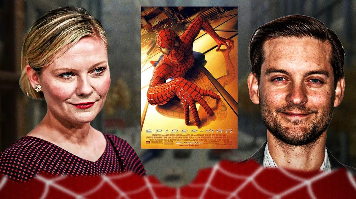 Kirsten Dunst and Tobey Maguire with Spider-Man poster.