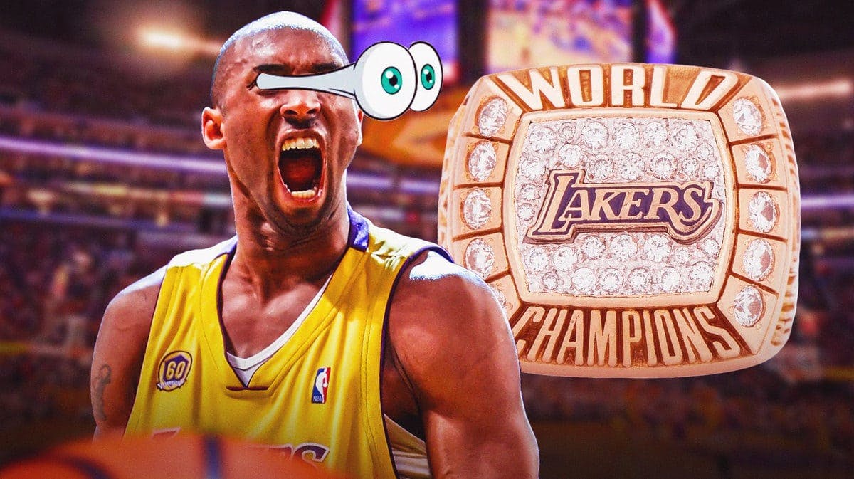 Kobe Bryant with his eyes popping out. Photo of his 2000 championship ring in the background
