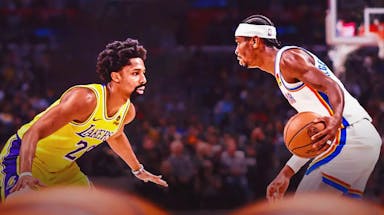 Lakers guard Spencer Dinwiddie plays defense against the Thunder