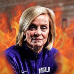 LSU women’s basketball coach Kim Mulkey, with flames around her on a basketball court