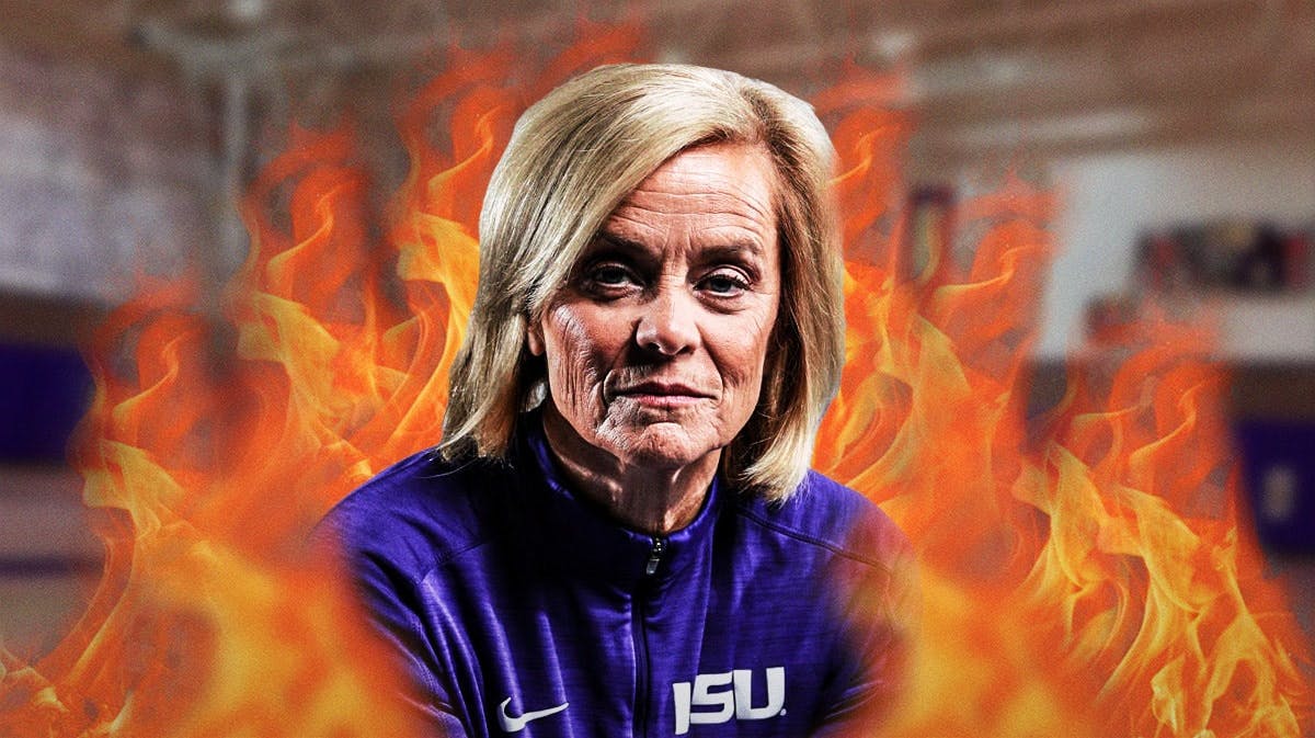 LSU women’s basketball coach Kim Mulkey, with flames around her on a basketball court