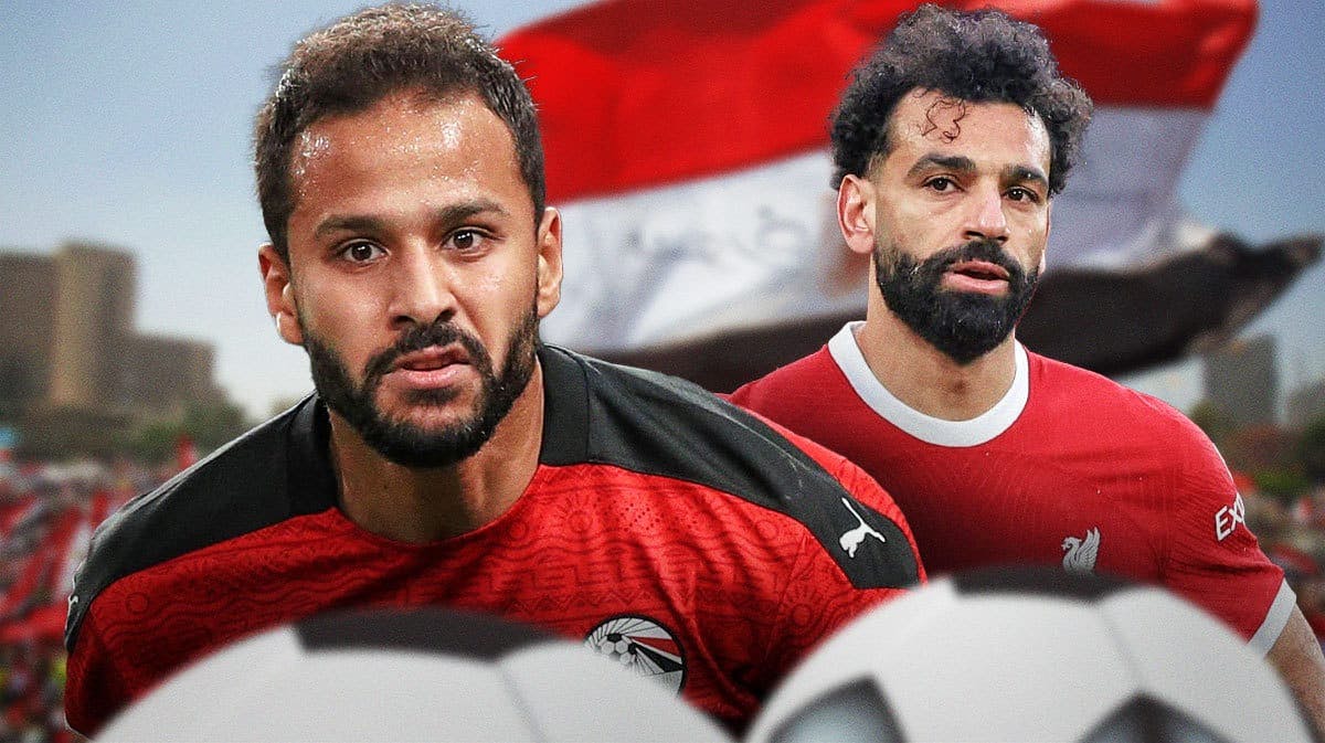 Mohamed Salah and Ahmed Refaat in front of the Egyptian flag