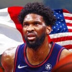 Joel Embiid in front of France's and United States' flags