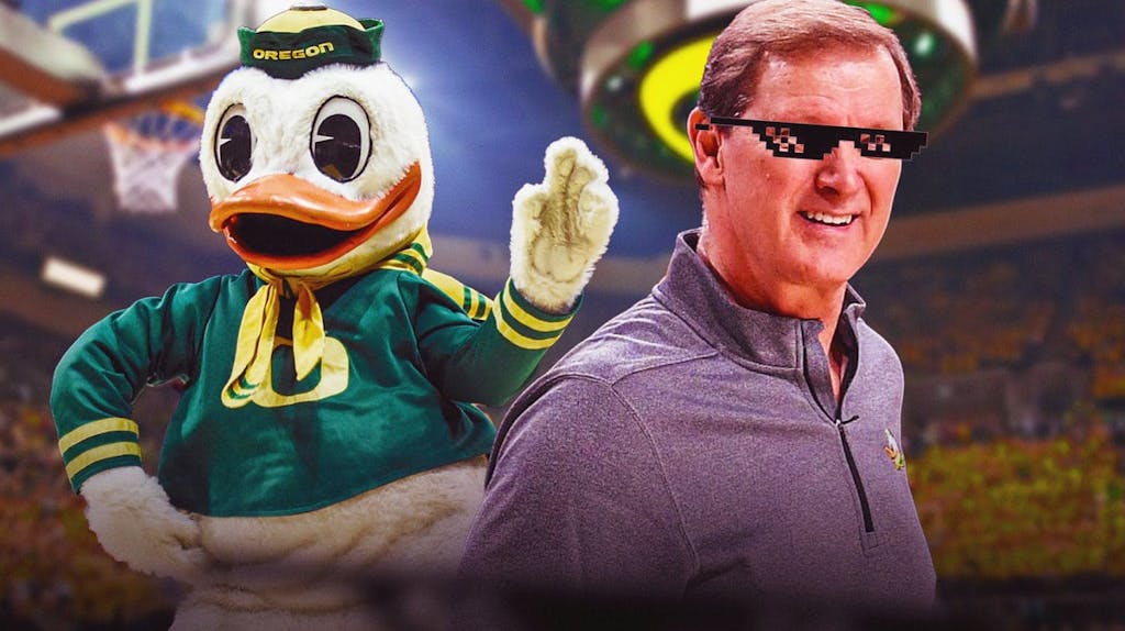 Dana Altman (Oregon basketball head coach) with deal with it shades and with Oregon Ducks mascot in the background