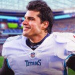 Mason Rudolph wearing Tennesee Titans jersey with stadium in the background.