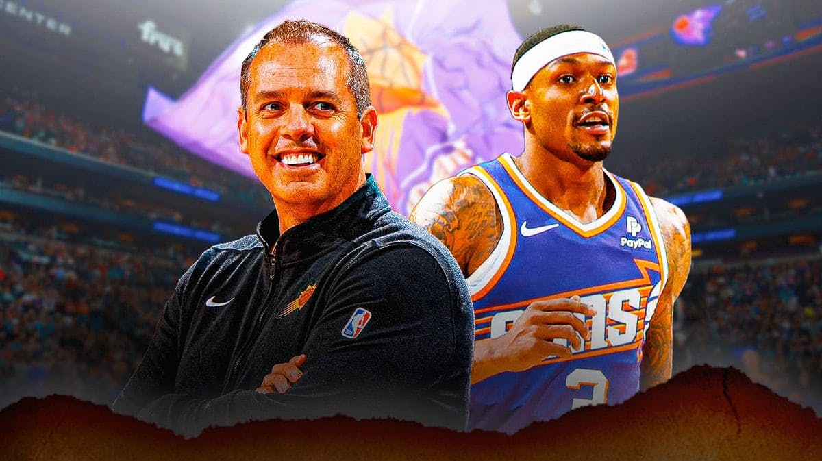 Phoenix Suns coach Frank Vogel smiling next to point guard Bradley Beal