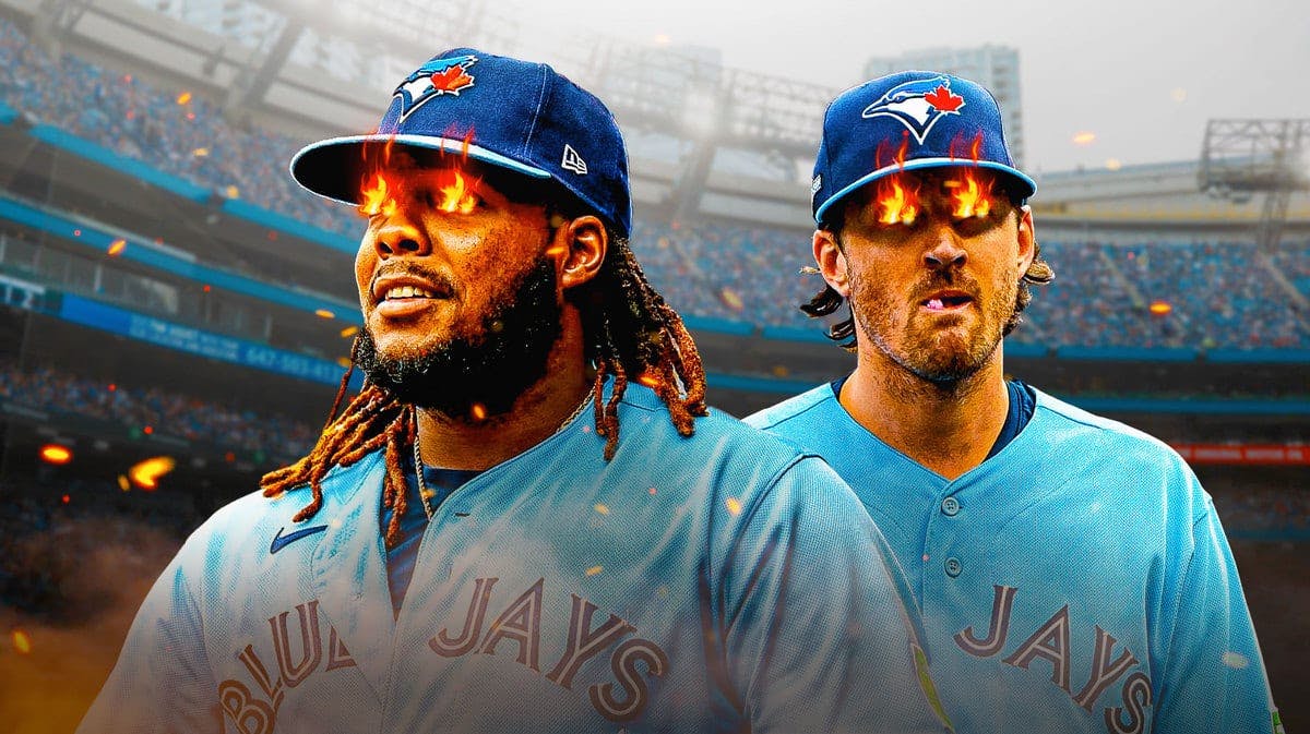 Blue Jays' Vladimir Guerrero Jr. on left with fire in eyes. Blue Jays' Kevin Gausman on right with fire in eyes. Rogers Centre background.