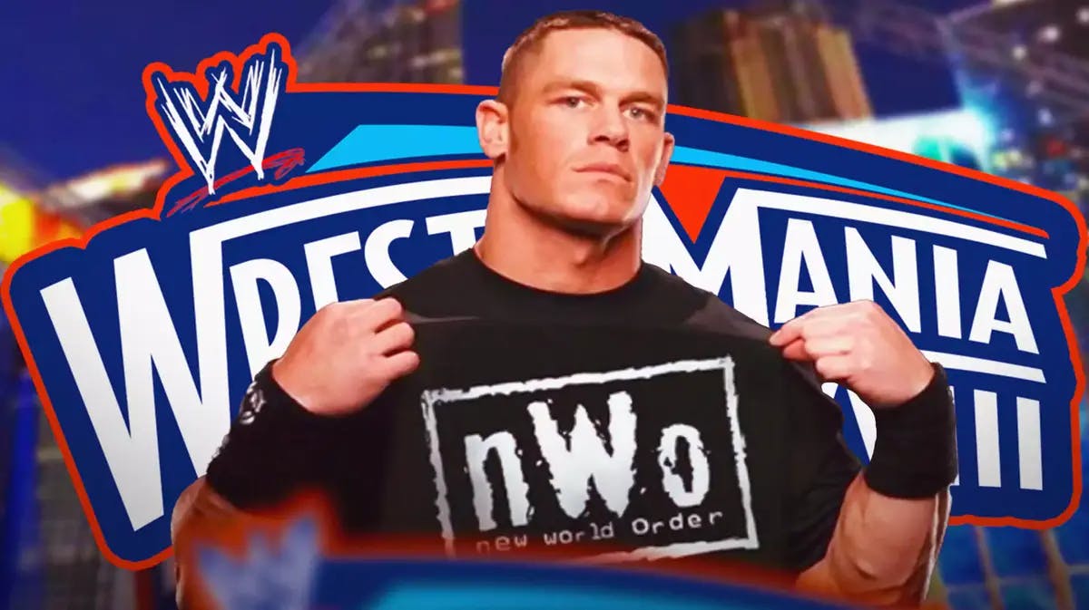 John Cena wearing an NWO shirt with the WrestleMania XXVIII logo as the background.