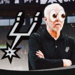 Gregg Popovich next to a Spurs logo at the Frost Bank Center