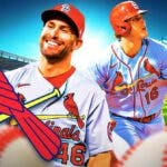 Paul Goldschmidt and Nolan Gorman looking stern, St. Louis Cardinals logo, baseball field in background