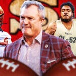 GM John Lynch in the middle, Jordan Morgan, TJ Tampa, Jalyx Hunt around him, and San Francisco 49ers wallpaper in the background