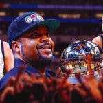 Ice Cube holding the Big 3 trophy and Caitlin Clark and Kelsey Plum are on his sides