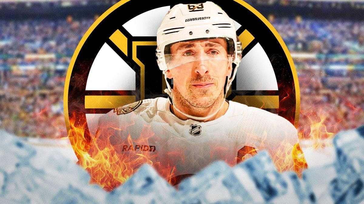 Brad Marchand in middle of image looking happy with fire around him, Boston Bruins logo, hockey rink in background
