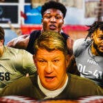 GM Jason Licht in the middle, Jackson Powers-Johnson, Marshawn Kneeland, Malik Washington around him, and Tampa Bay Buccaneers wallpaper in the background