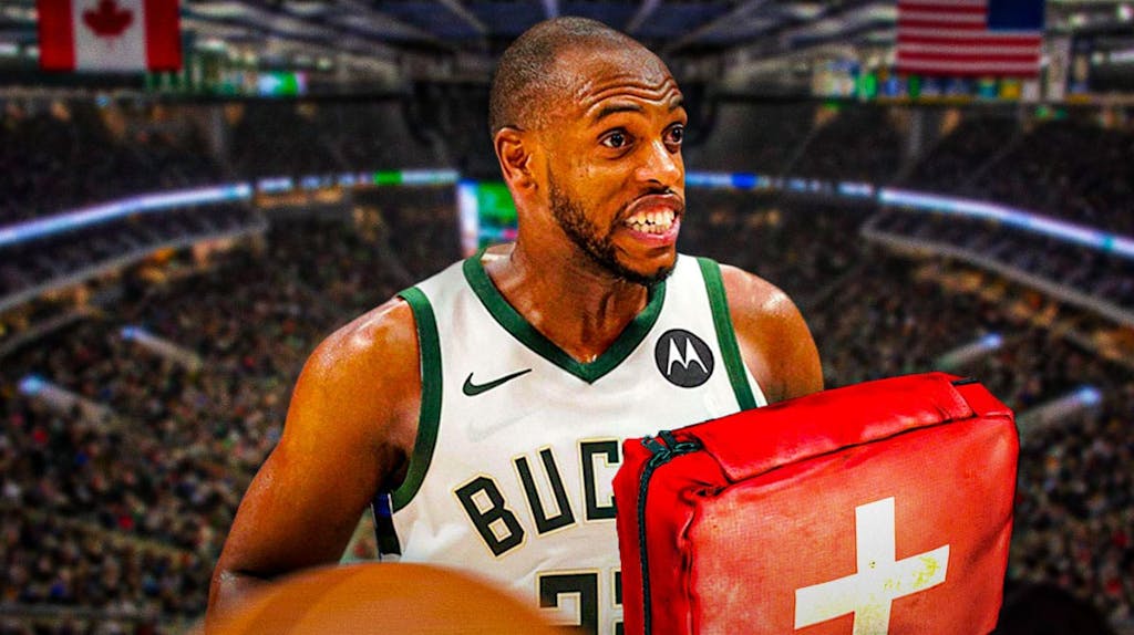 Photo: Khris Middleton looking disappointed in Bucks jersey, medical kit beside him