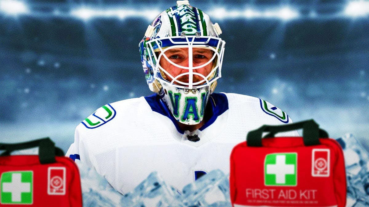 Canucks goaltender Thatcher Demko with red medical bags next to him