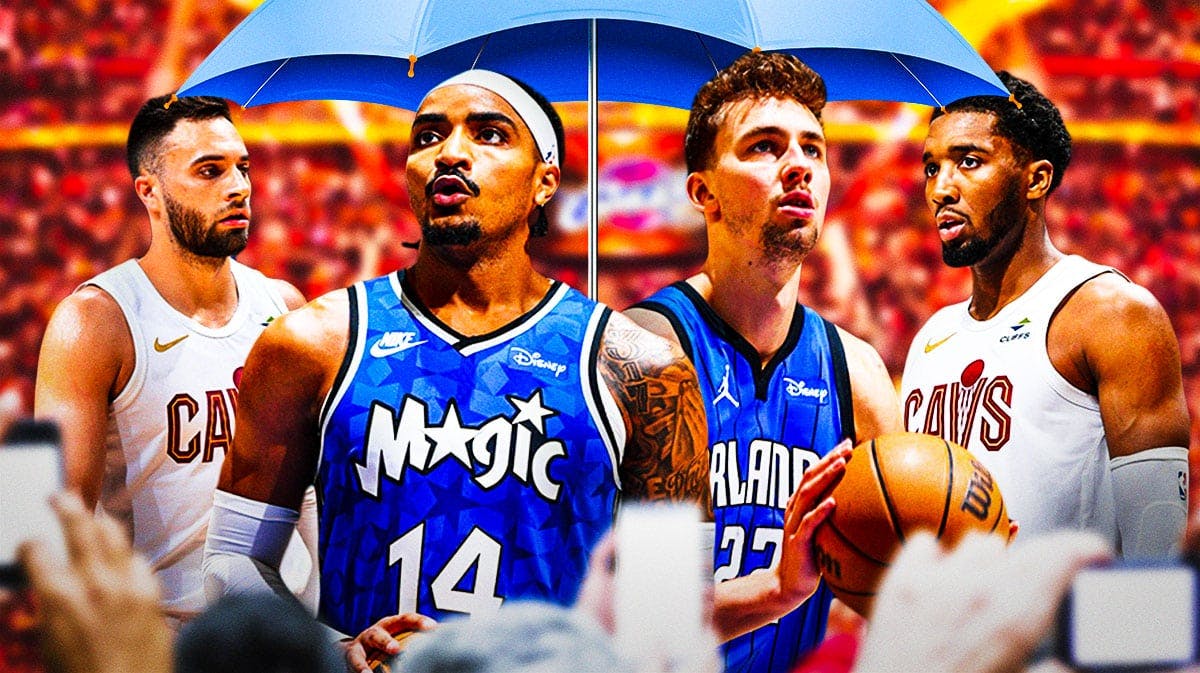 Cavs' Donovan Mitchell and Max Strus under an umbrella with Magic's Franz Wagner and Gary Harris