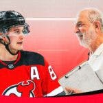 Jack Hughes (Devils) looking serious and having a conversation with a doctor