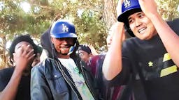 Mookie Betts (Dodgers) as the guy in the hoodie and Shohei Ohtani as the guy on the right with hands on head