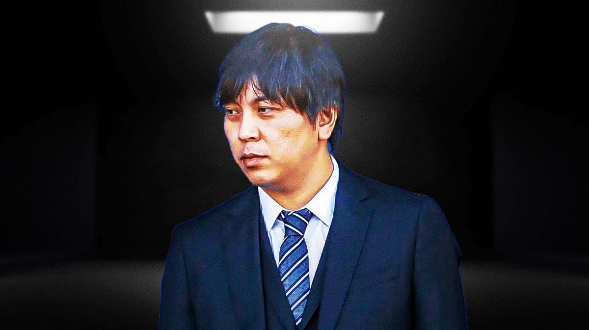 Ippei Mizuhara looking serious in a dark room.