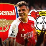 Granit Xhaka laughing in front of the Arsenal and Bayer Leverkusen logos