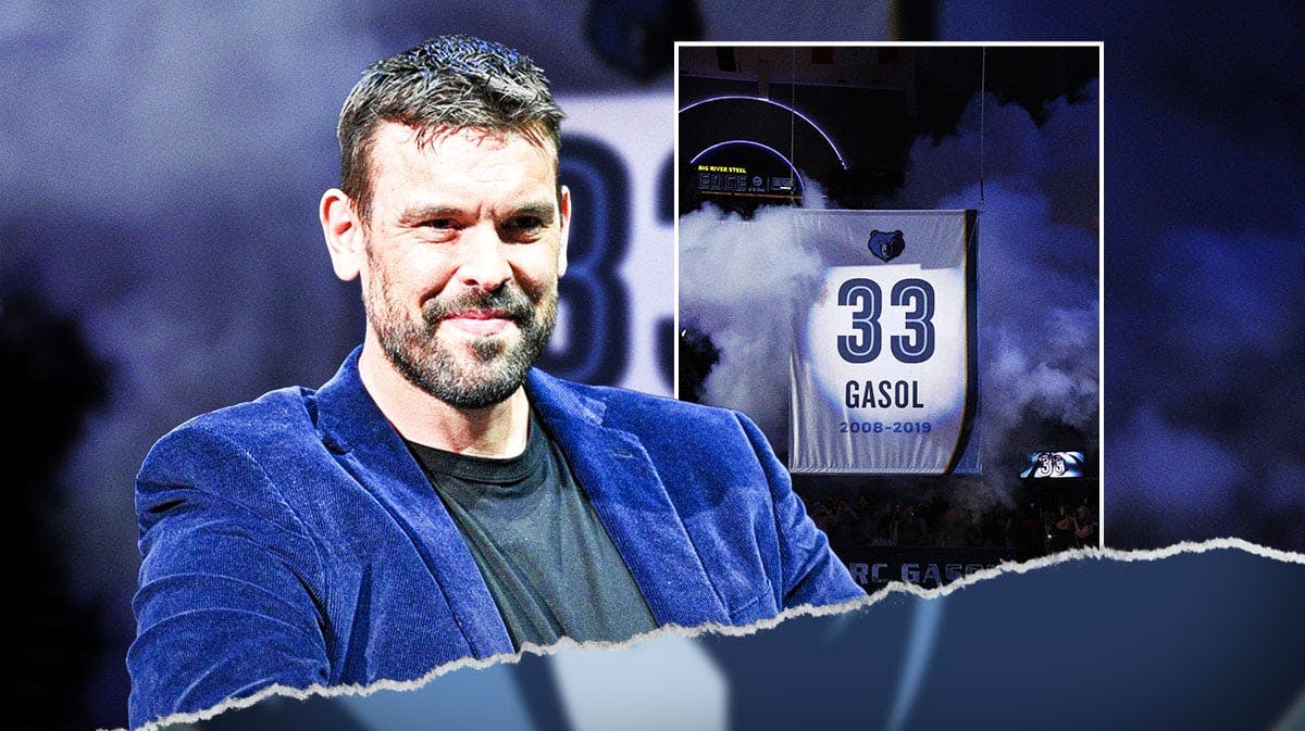 Marc Gasol next to picture of Grizzlies jersey being lifted to rafters