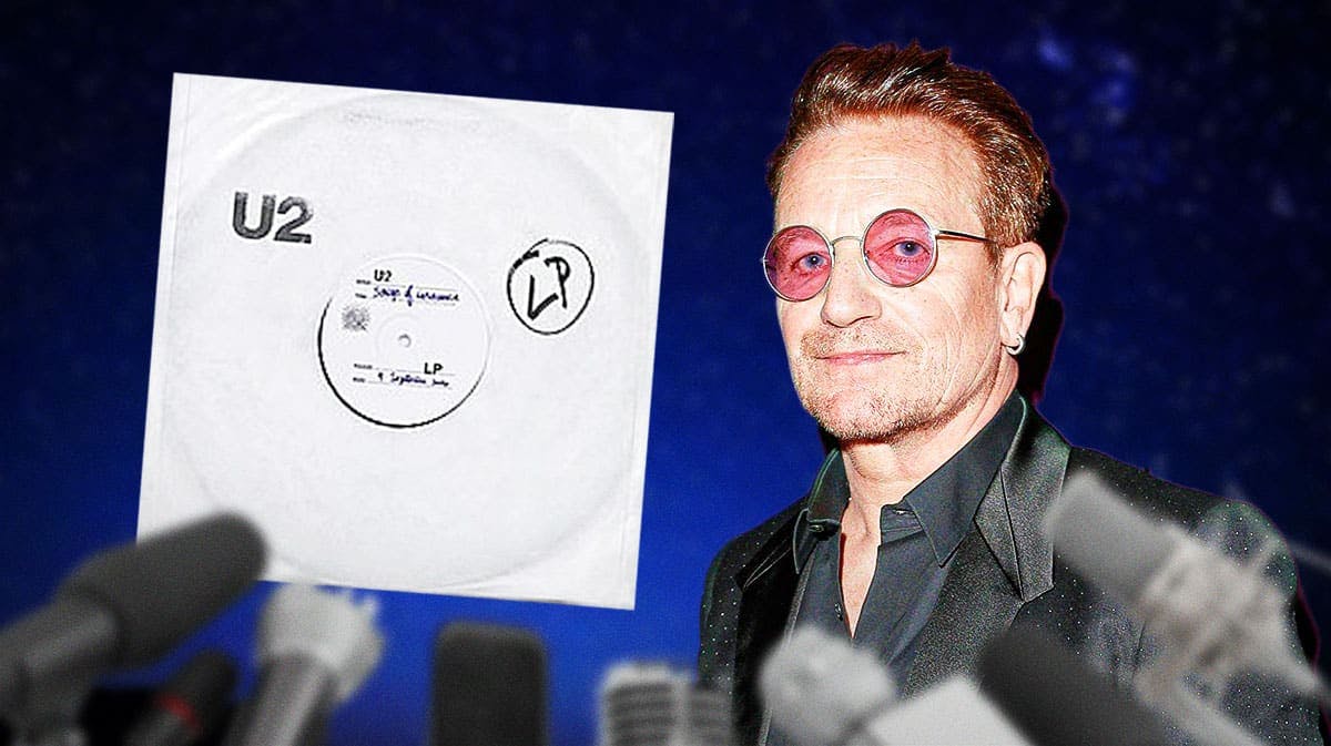 U2 singer Bono with Songs of Innocence album cover (with Iris Hold Me Close) and stars background.