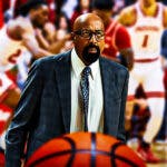 Indiana basketball coach Mike Woodson watching his players.