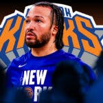 Knicks' Jalen Brunson looks at 76ers fans, NBA Playoffs reporters in background