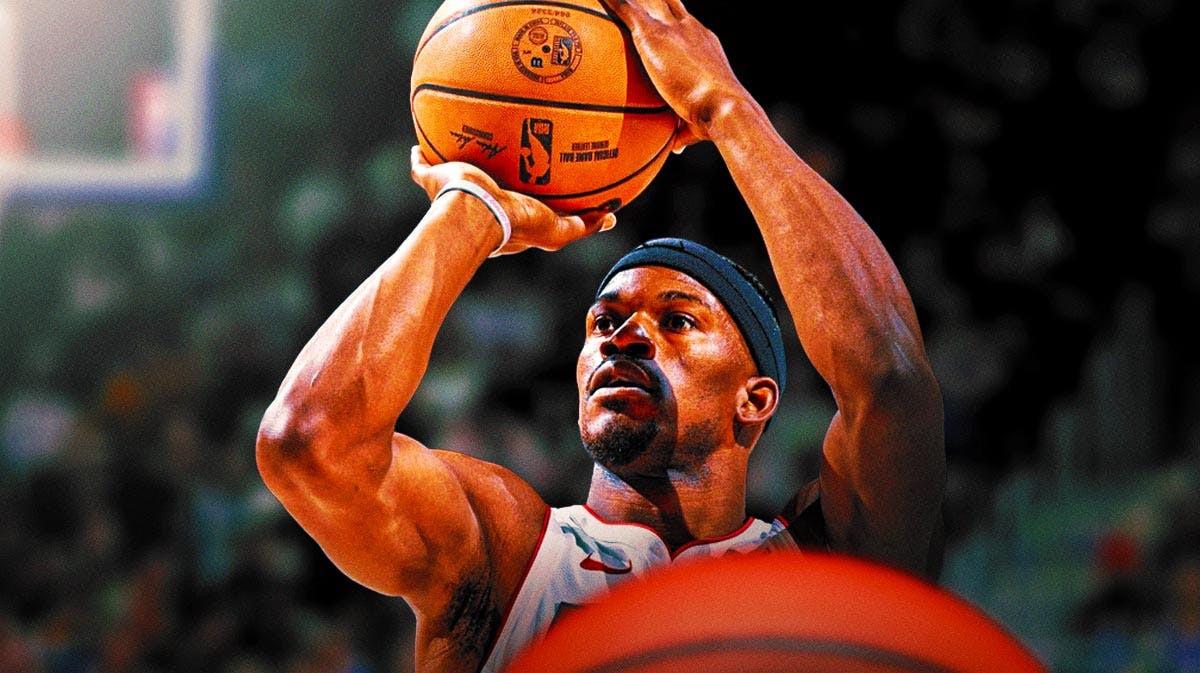 Heat's Jimmy Butler shooting a basketball.