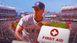 Yankees reliever Jonathan Loaisiga with medical kit next to him