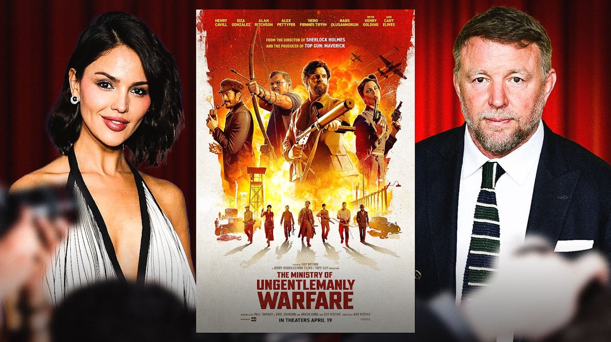 Eiza González, Guy Ritchie with The Ministry of Ungentlemanly Warfare poster.