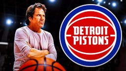 Pistons owner Tom Gores, looking upset. Pistons logo next to him.
