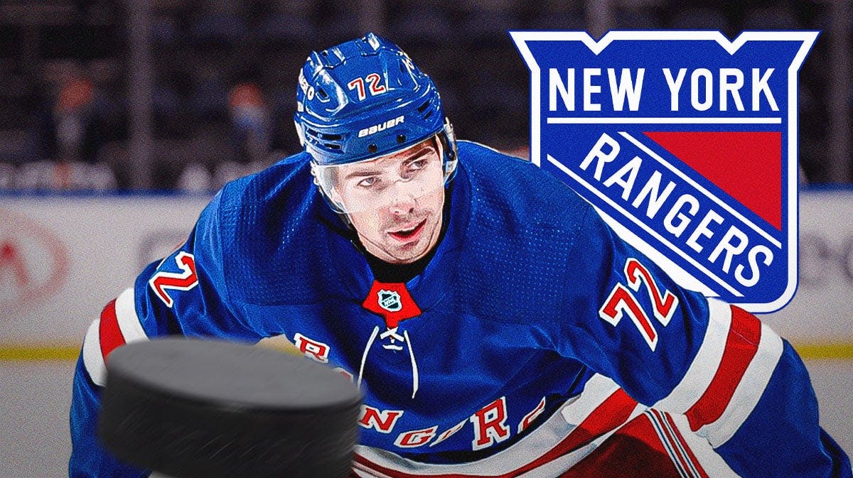 Filip Chytil in middle of image looking hopeful, New York Rangers logo, hockey rink in background