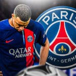 Kylian Mbappe looking down/sad in front of the PSG logo