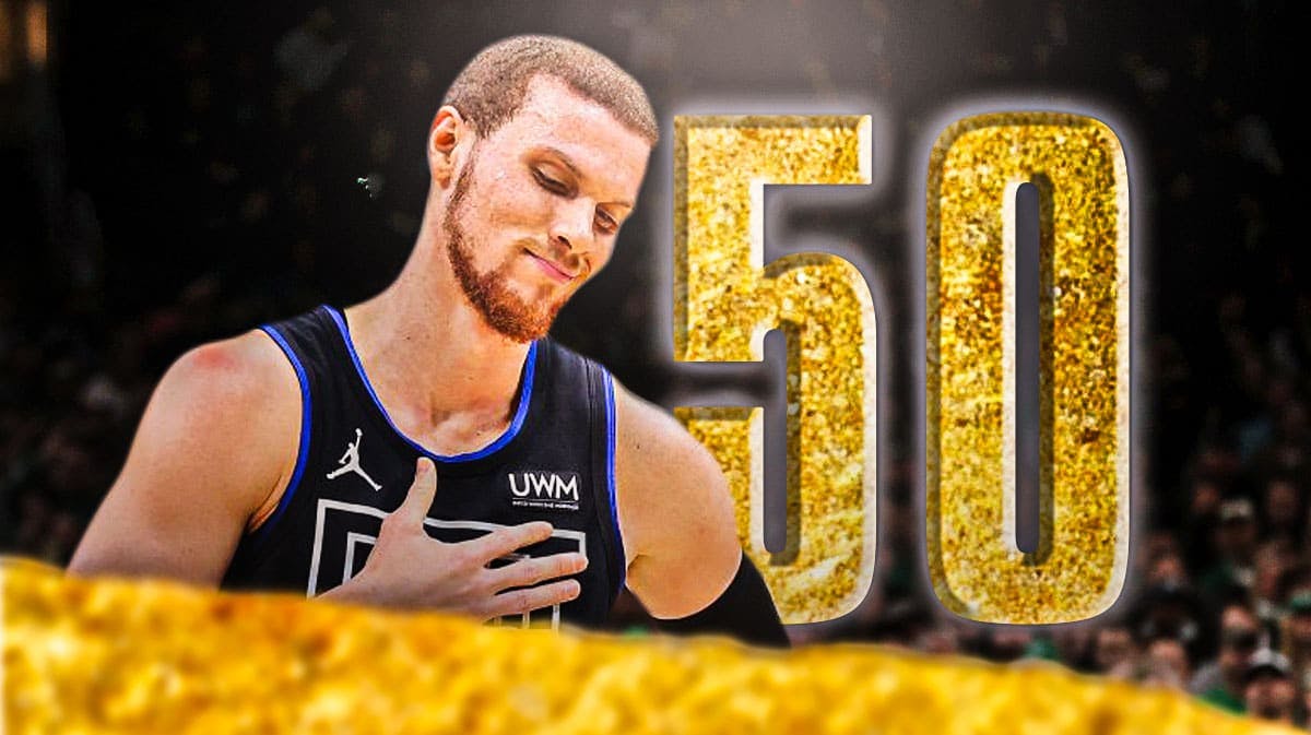 Pistons' Malachi Flynn in front of a golden 50