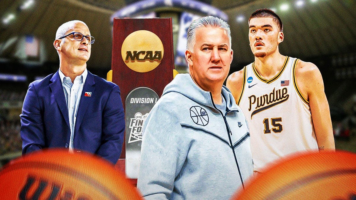 Purdue basketball coach Matt Painter and Zach Edey looking at the trophy with uConn coach Dan Hurley.