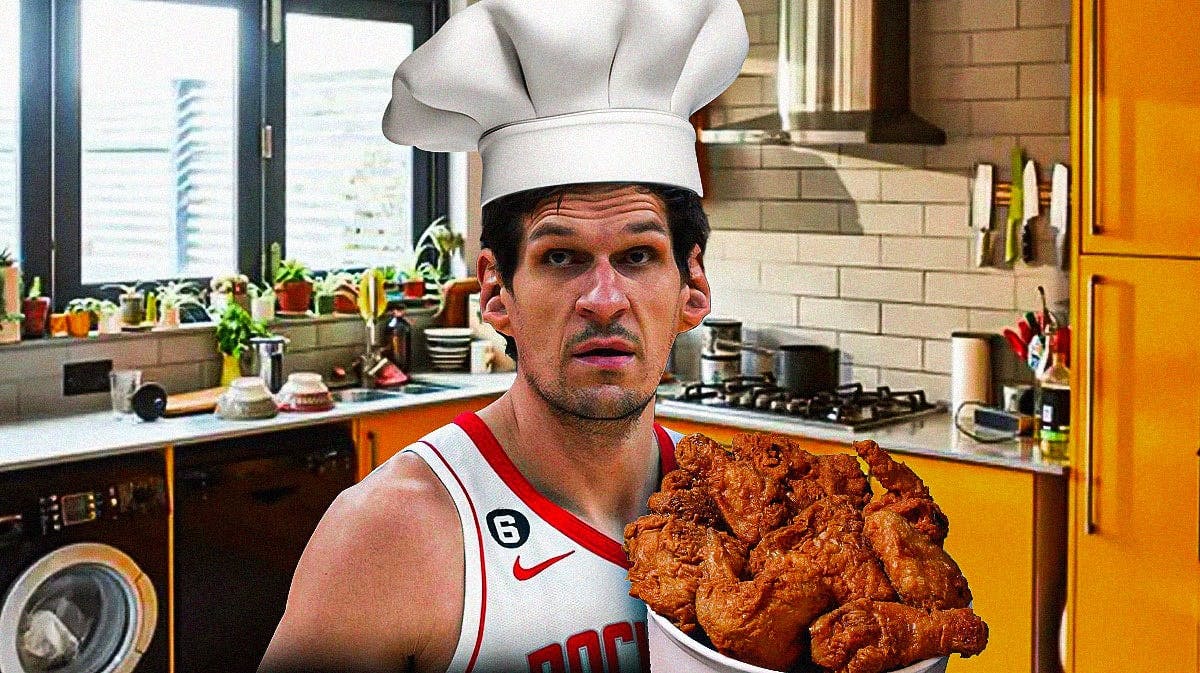 Rockets' Boban Marjanovic as a chef, holding a bucket of fried chicken
