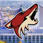 Coyotes logo in front of Salt Lake City