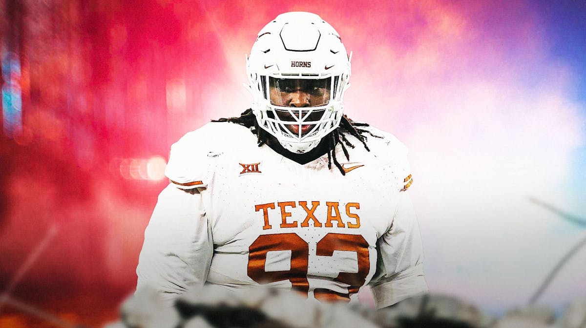 T’Vondre Sweat (Texas football) looking serious with police siren in the background
